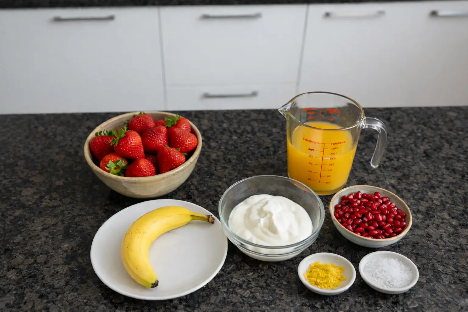 pomegranate-smoothie-ingredients Fresh ingredients for making a pomegranate smoothie.
