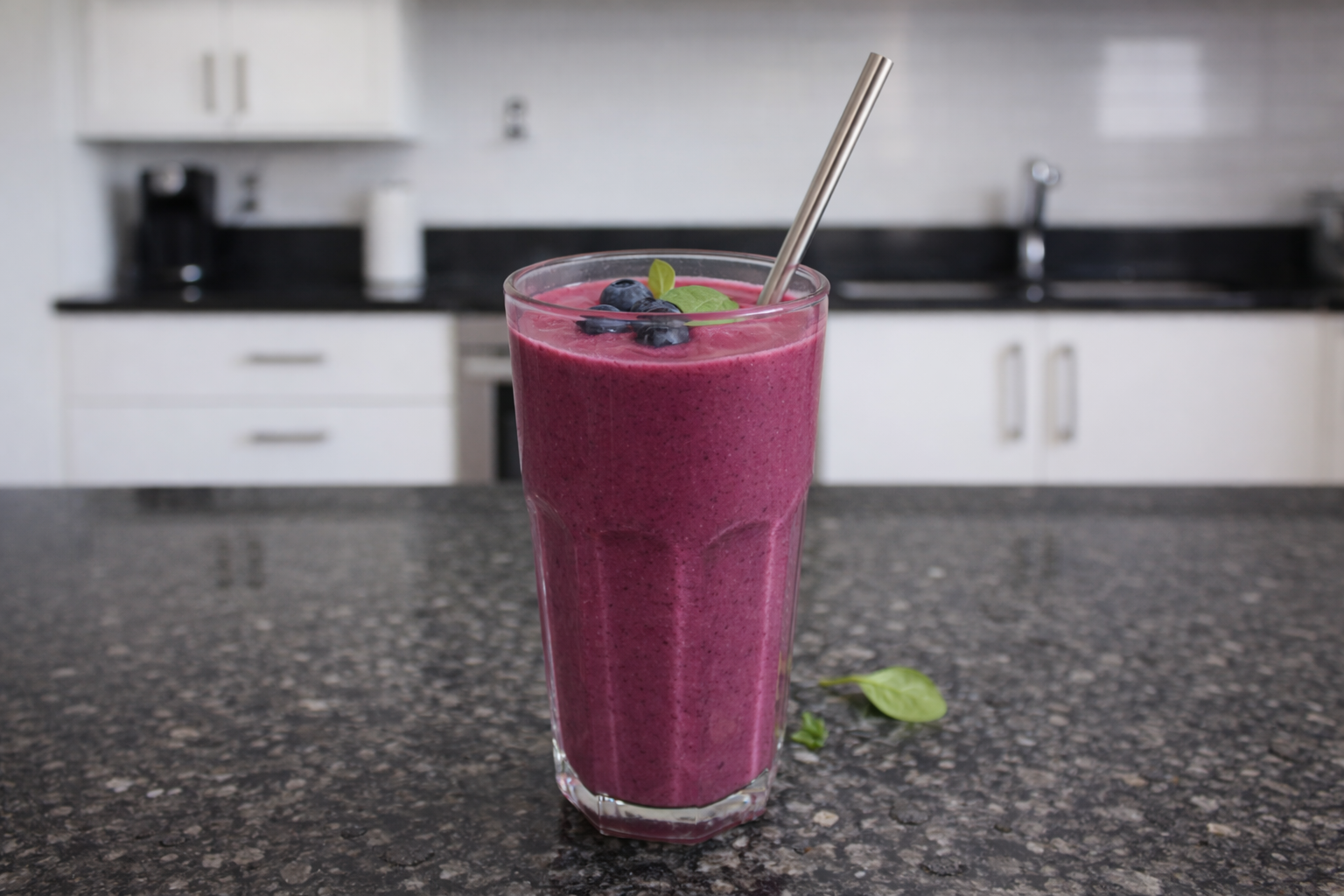 Ultra creamy spinach berry smoothie made with blueberries, spinach, and chia seeds. A healthy antioxidant-rich smoothie perfect for breakfast.